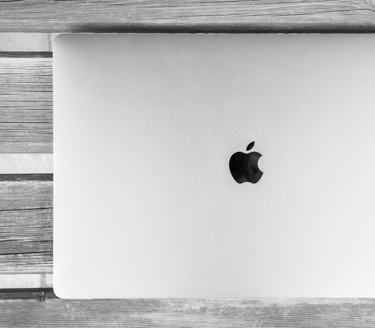 Apple laptop on table